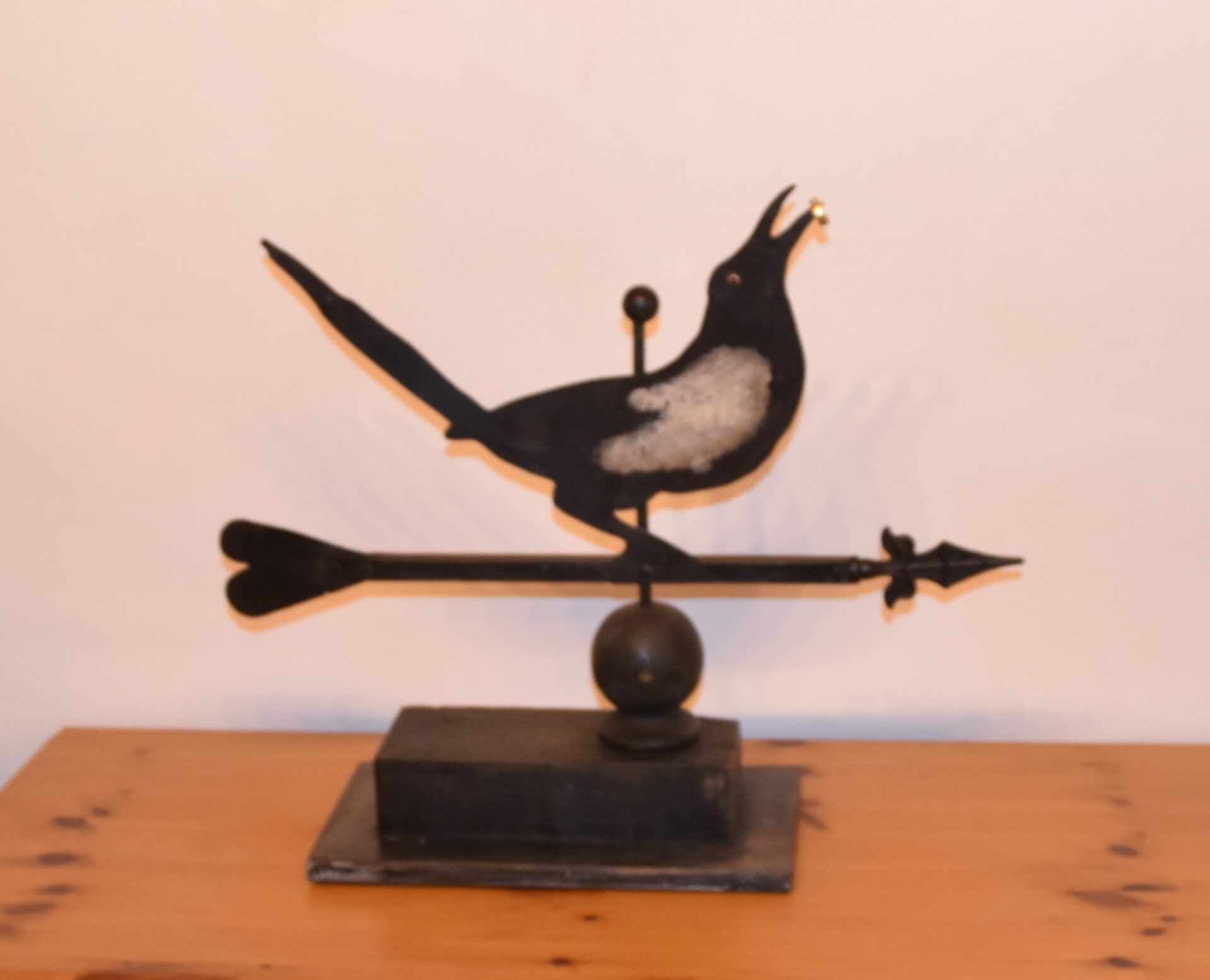 Metal sculpture of a magpie